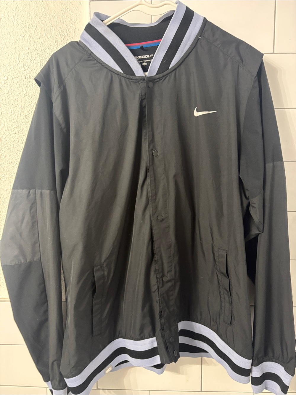 Nike Black Golf Bomber windbreaker Jacket with White Swoosh and Striped Trim